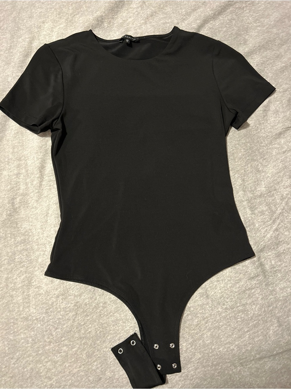 Black Short-Sleeve Snap-Closure One-Piece Bodysuit